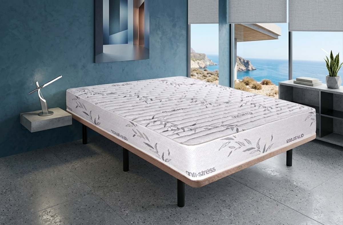 Ambiente dormitorio 2 con colchón ibiza + base tapizada + almohada de visco.
